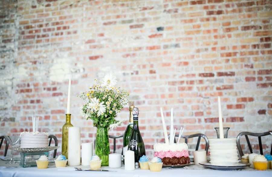 Styled celebration table with flowers and candles